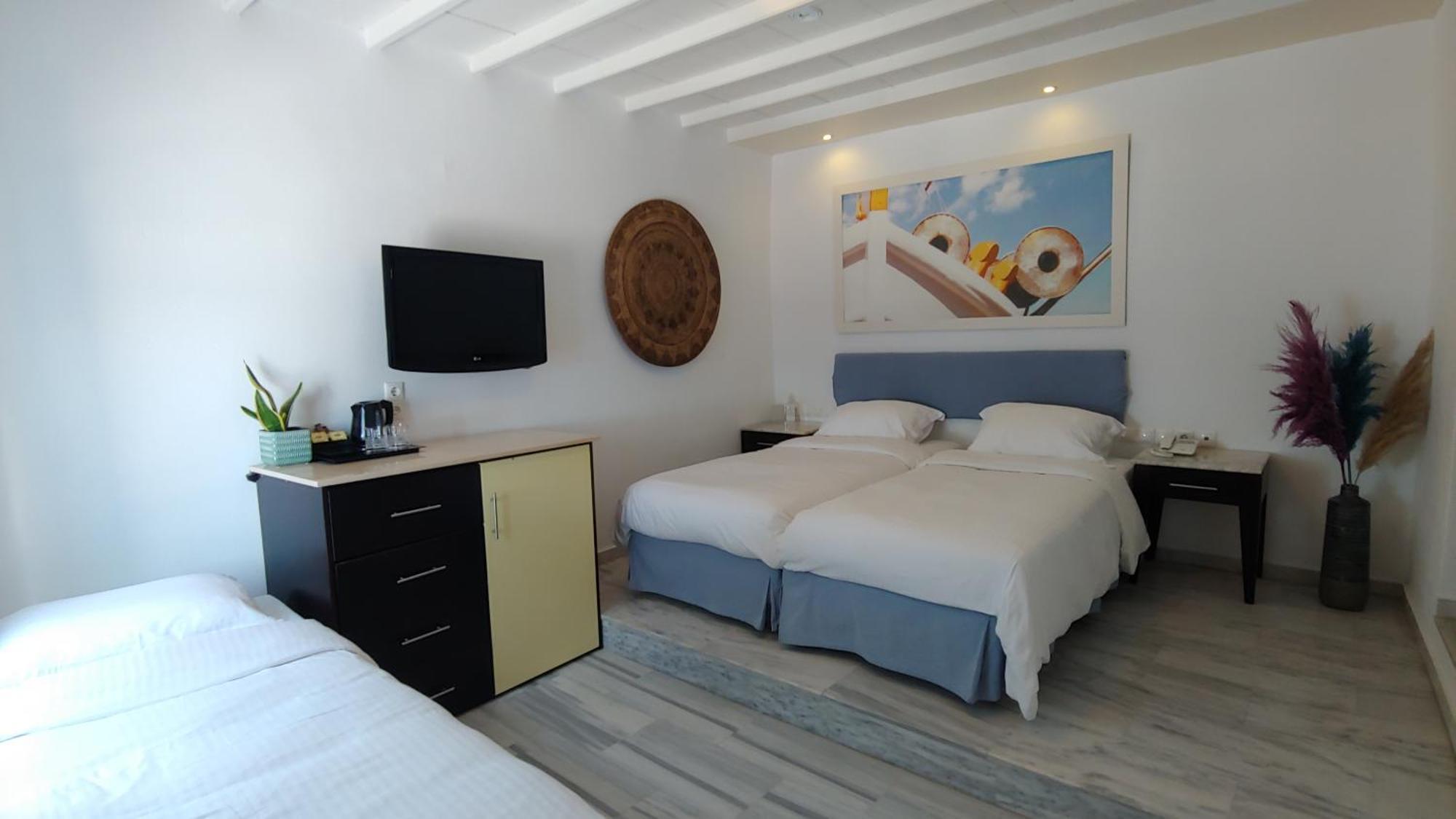 Superior Triple Room with Sea View,1208120164:JPEG